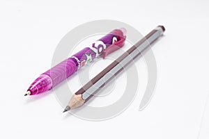 Pencil with a pink pen.