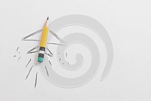 Pencil and rocket sketch over textured paper, concept of back to school, creativity and success