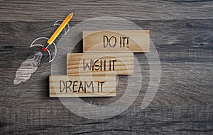 Pencil rocket withg business message Dream it, Wish it, Do it