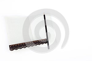 Pencil And Ruler On Notebook. Pencil and ruler on notebook with copy space on white background. Instagram concept