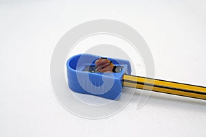 Pencil and sharpener. Sharpening pencil. School pencil and sharpener.