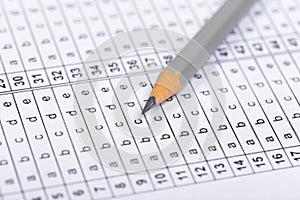 A pencil sitting on a test bubble sheet