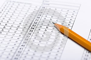 A pencil sitting on a test bubble sheet