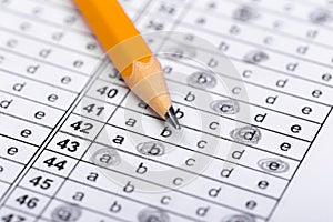 A pencil sitting on a test bubble sheet