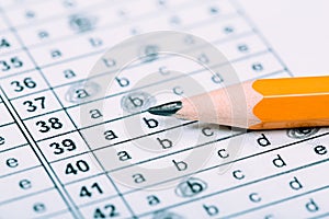 A pencil sitting on a test bubble sheet