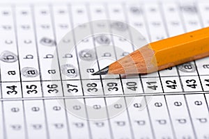 A pencil sitting on a test bubble sheet