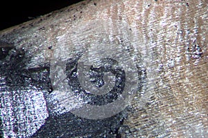Pencil tip macro. Graphite lead by microscope. Stationery writing accessories