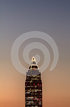 The pencil tower(Messeturm) at sunset photo