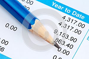 Pencil and wage slip