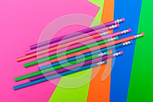 Pencils and bright colored poster board