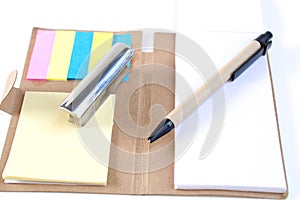 Pencils, pens, paperweights, put on your desk, on a white backg photo
