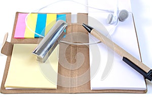 Pencils, pens, paperweights, put on your desk, on a white backg photo