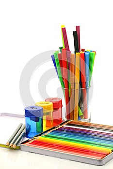 Pencils, pens and sharpeners