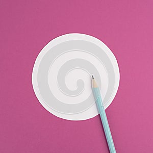 Pencils on a pink paper background, white circle frame with copy space for text, minimalism, creative and business concept, pastel
