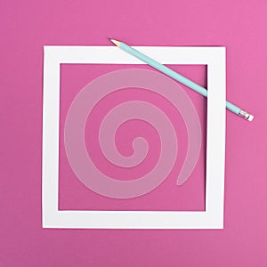 Pencils on a pink paper background, white frame with copy space for text, minimalism, creative and business concept, pastel