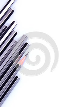 Pencils row on isolated white background