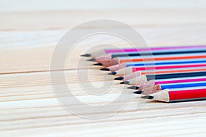 Pencils on a wooden table. Back to school