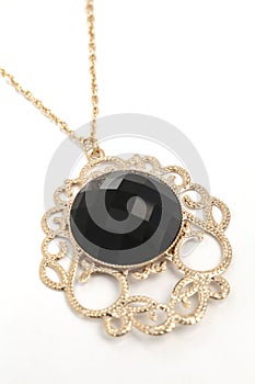 Pendant of black gem with chain