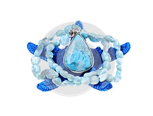 Pendant of blue larimar stone on a starfish on isolated white background. Larimar is the native stone of the Dominican Republic. S