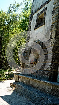 PENDANT HOUSE among the plants in the sacred wood of Bomarzo. a natural park adorned with numerous basalt sculptures, inaugurated