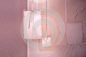 Pendant lamp, chandelier in the children`s bedroom in pink colors for a little princess