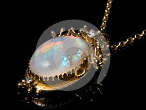 Pendant of a necklace made of gold, opal gemstone