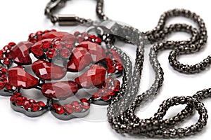 Pendant of red gem with chain