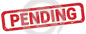 PENDING text written on red rectangle stamp