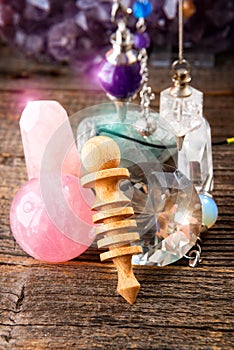 Pendulum and crystals photo