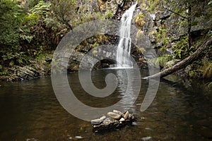Penedo Furado Waterfall next to Milreu village photo