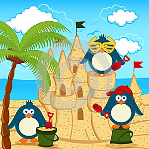 Penguin built sand castle photo