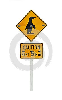 Penguin caution sign isolated on white