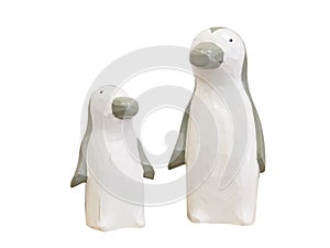 Penguin wooden dolls isolated on white background. Clipping path