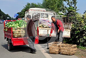 Pengzhou, China: Farmers Unloading Cabbages