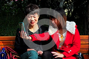 Pengzhou, China: Teenagers Taking Photo with Cellphone