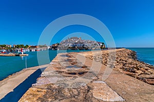 Peniscola Spain port and castle view along harbour wall