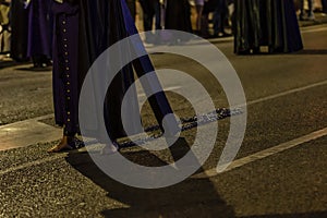 Penitent with chains and cross