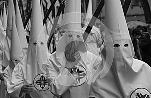 Penitents lined up in procession at Easter photo