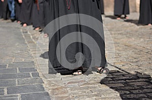 Penitents with the rosary, parade in the streets of the cities