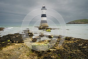 Penmon lighthouse sits at the start of the Menai Strait across from Puffin Island