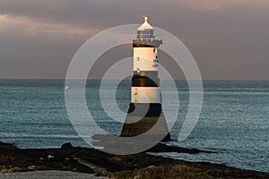 Penmon, pen Mon Lighthouse at sunset, centred photo