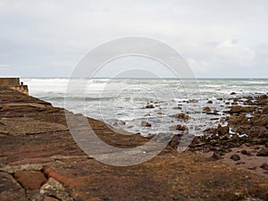 Pennan beach and village at low tide in September 2022. Aberdeenshire, Scotland, UK