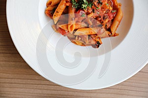 Penne arrabiata pasta tomato sauce with spices italian food