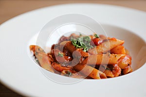 Penne arrabiata pasta tomato sauce with spices italian food