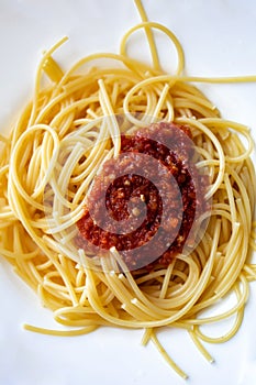 Italian Pasta Spaghetti Bolognese On White Plate.