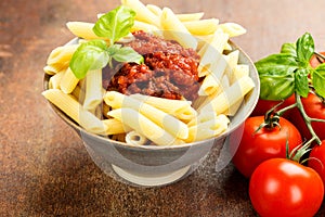 Penne pasta with a tomato bolognese beef sauce