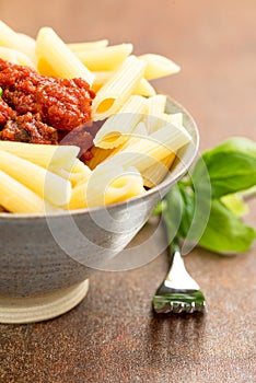 Penne pasta with a tomato bolognese beef sauce