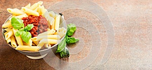 Penne pasta with a tomato bolognese beef sauce