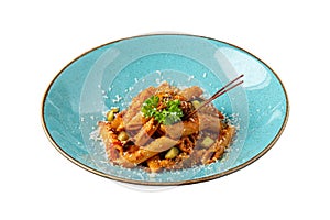 Penne pasta in tomato sauce, tomatoes decorated with parsley on a white background