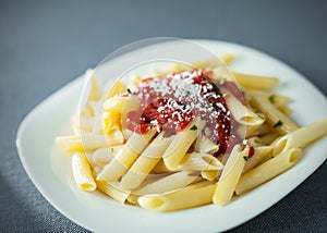 Penne rigate pasta with spicy sauce